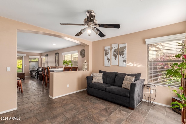 living room with ceiling fan