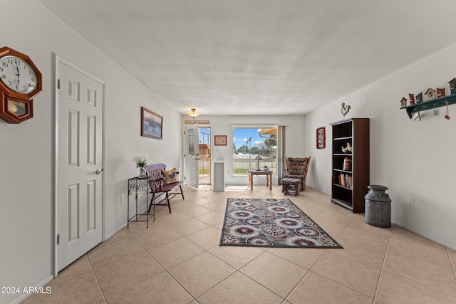 sitting room featuring light tile flooring