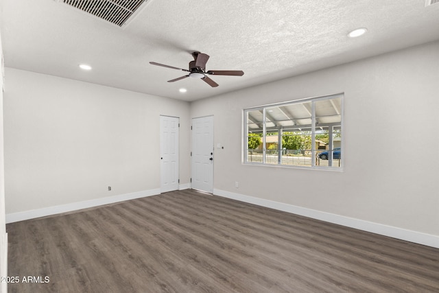 4048 W Granada Rd, Phoenix, AZ 85035 - unfurnished room featuring dark wood finished floors, recessed lighting, a ceiling fan, and a textured ceiling
