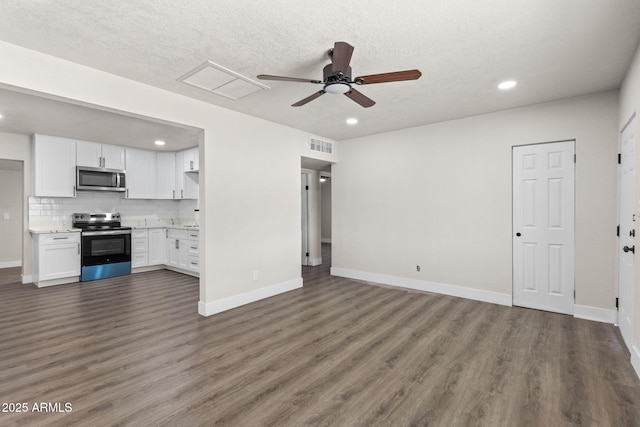 4048 W Granada Rd, Phoenix, AZ 85035 - unfurnished living room with recessed lighting, a ceiling fan, dark wood-type flooring, and a textured ceiling