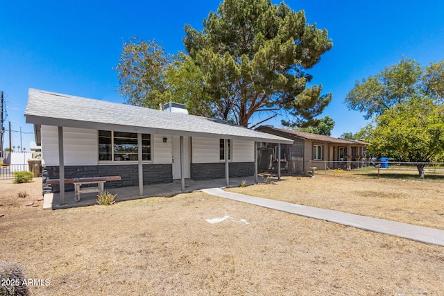 4048 W Granada Rd, Phoenix, AZ 85035 - ranch-style home featuring stone siding