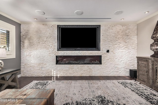 living room with crown molding and dark hardwood / wood-style floors