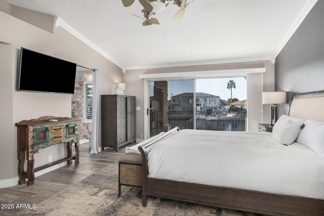 bedroom with crown molding, vaulted ceiling, access to outside, and hardwood / wood-style floors