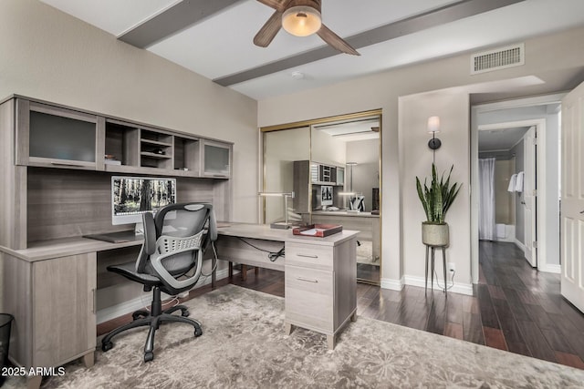 office with ceiling fan and dark hardwood / wood-style flooring