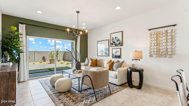 living room featuring light tile patterned floors, baseboards, recessed lighting, and a notable chandelier
