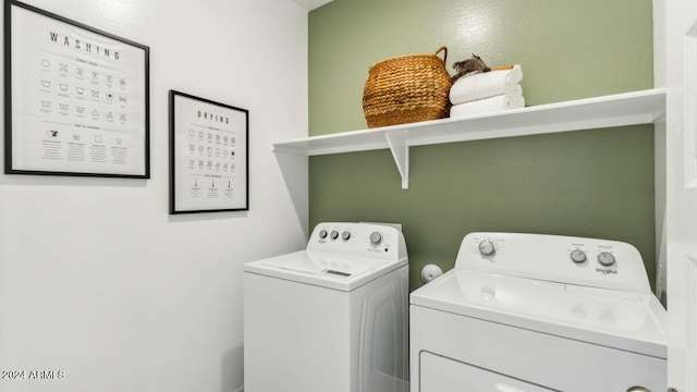 laundry room featuring laundry area and washing machine and dryer