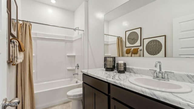 bathroom with vanity, shower / tub combo with curtain, tile patterned flooring, and toilet
