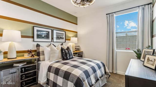 carpeted bedroom with baseboards
