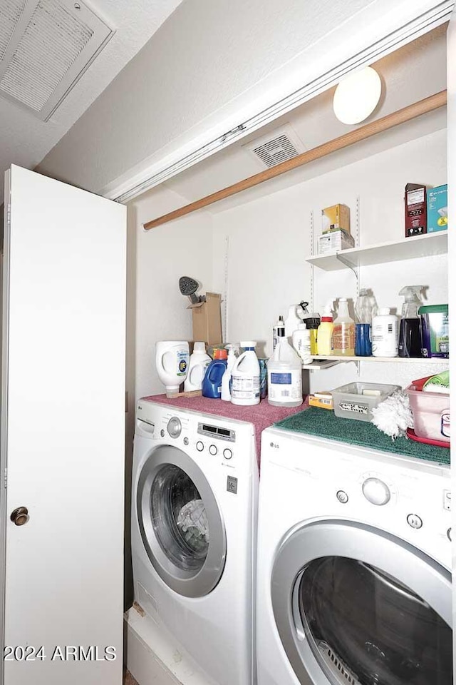 laundry area featuring washer and dryer