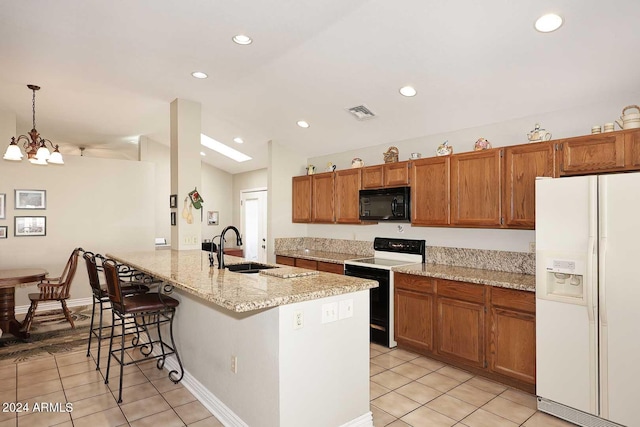 kitchen with white refrigerator with ice dispenser, sink, kitchen peninsula, pendant lighting, and electric range oven