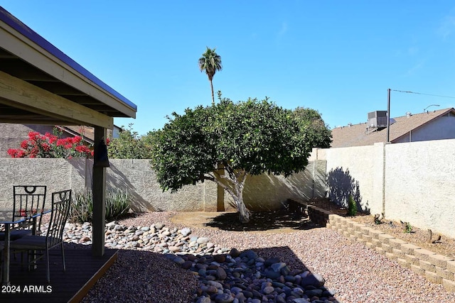 view of yard featuring central AC