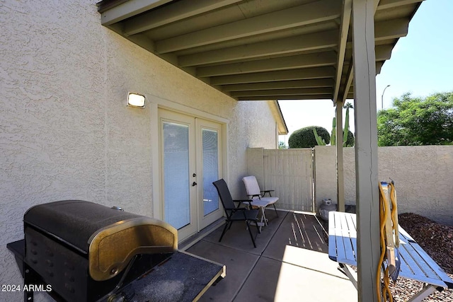 view of patio with grilling area and french doors