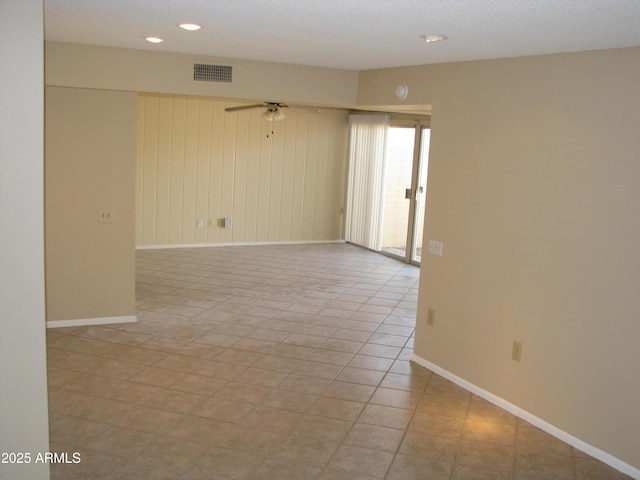 unfurnished room with baseboards, visible vents, ceiling fan, and recessed lighting