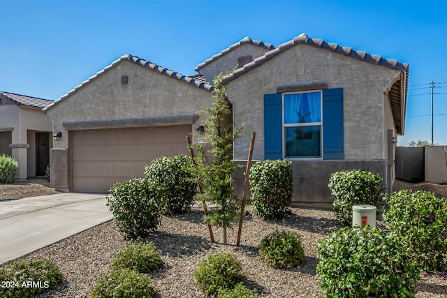 view of front of home featuring a garage