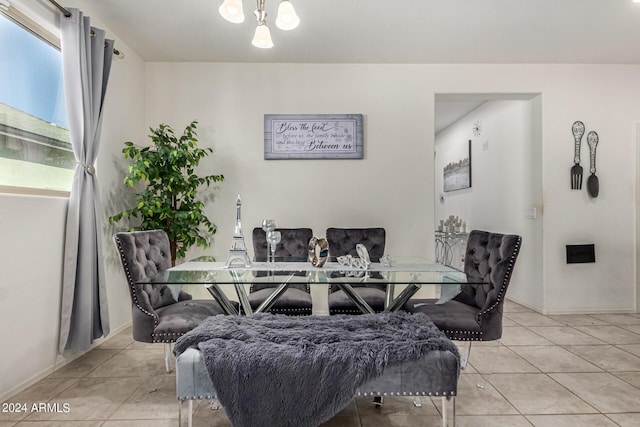 dining room featuring light tile patterned flooring