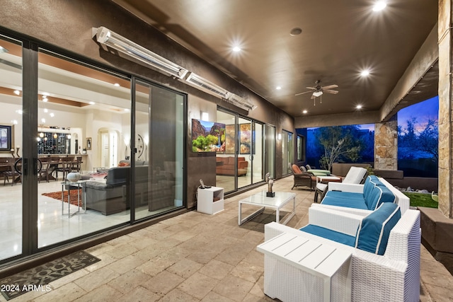 view of patio featuring a ceiling fan and outdoor lounge area