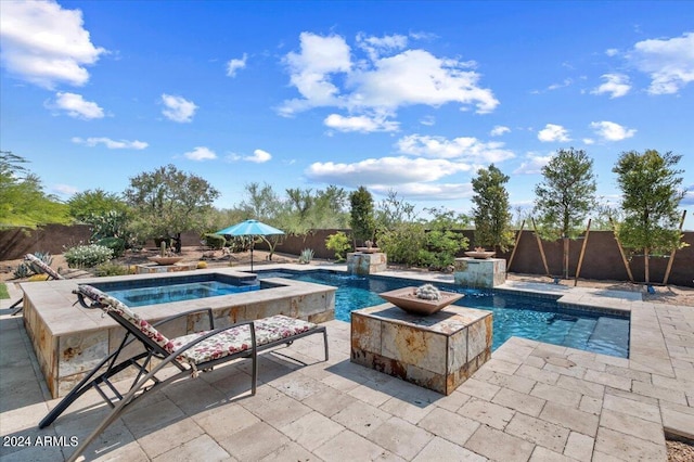 view of pool featuring a fenced in pool, a fire pit, a fenced backyard, and a patio area