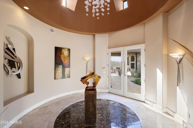 foyer entrance featuring visible vents, baseboards, recessed lighting, french doors, and marble finish floor