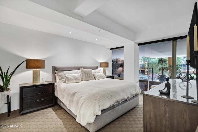 bedroom featuring access to outside and recessed lighting