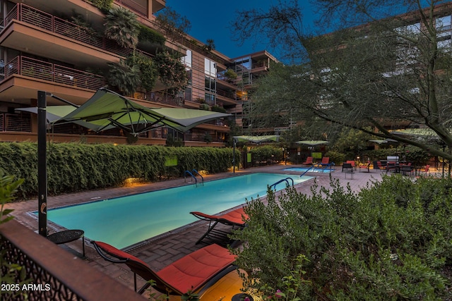 pool with a patio