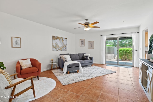 living room featuring ceiling fan and light tile patterned floors