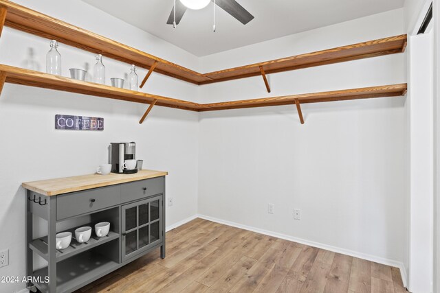 interior space featuring ceiling fan and light hardwood / wood-style flooring