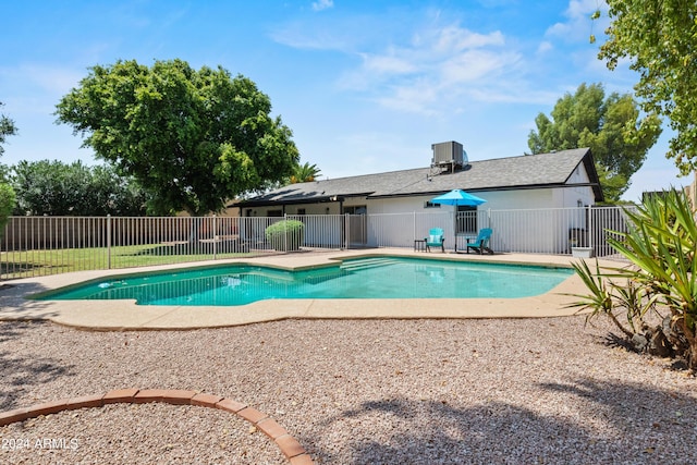 view of swimming pool with a patio