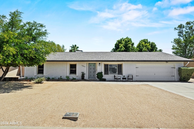 ranch-style house with a garage