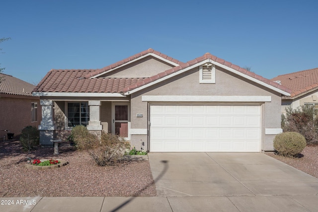 single story home with a garage