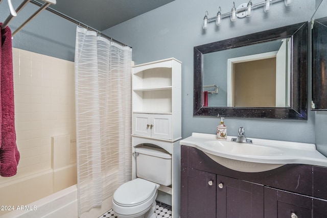 full bathroom featuring vanity, toilet, and shower / bath combo with shower curtain