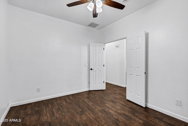 unfurnished bedroom with dark hardwood / wood-style floors and ceiling fan