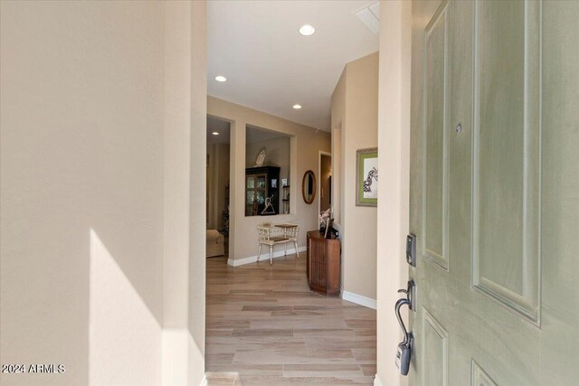 corridor featuring light wood-type flooring