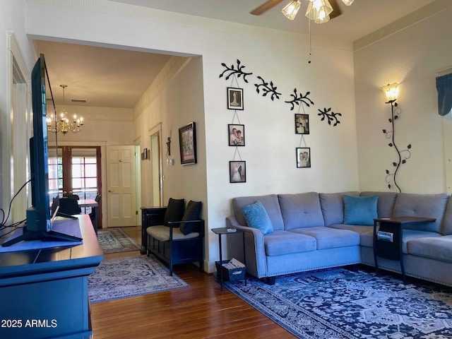 510 Tombstone Cyn, Bisbee, AZ 85603 - living area featuring wood finished floors, ceiling fan, and a chandelier