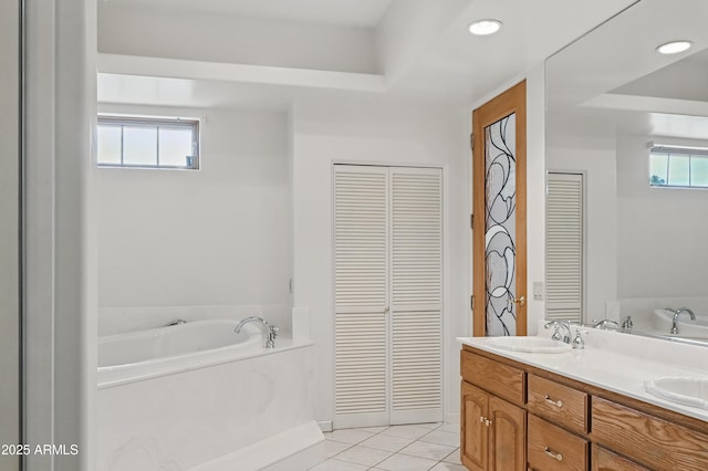 889 E Dealers Choice Ln, Payson, AZ 85541 - full bath featuring a sink, double vanity, tile patterned floors, a garden tub, and a closet