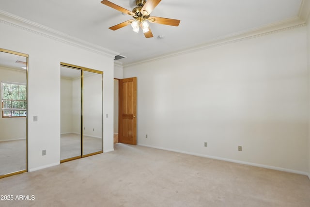 889 E Dealers Choice Ln, Payson, AZ 85541 - unfurnished bedroom with light carpet, two closets, baseboards, visible vents, and ornamental molding