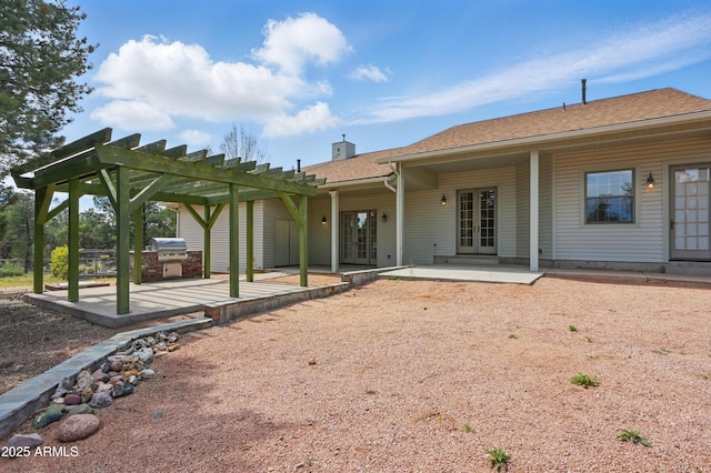 889 E Dealers Choice Ln, Payson, AZ 85541 - rear view of property featuring a pergola, a patio, roof with shingles, french doors, and a chimney
