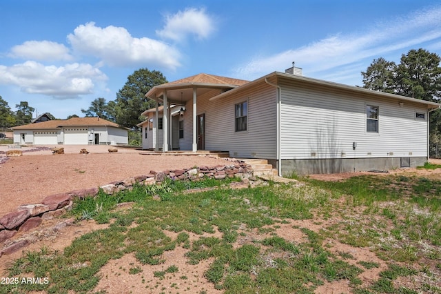 889 E Dealers Choice Ln, Payson, AZ 85541 - bungalow-style house featuring a detached garage and a chimney