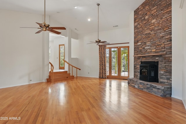 889 E Dealers Choice Ln, Payson, AZ 85541 - unfurnished living room with high vaulted ceiling, baseboards, a ceiling fan, and light wood-style flooring