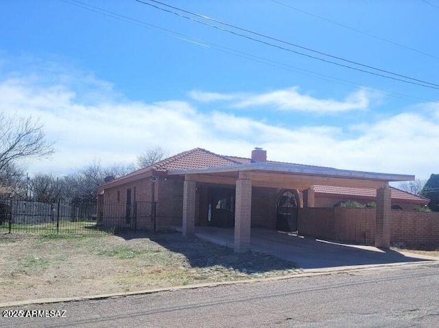 view of front of house featuring a carport