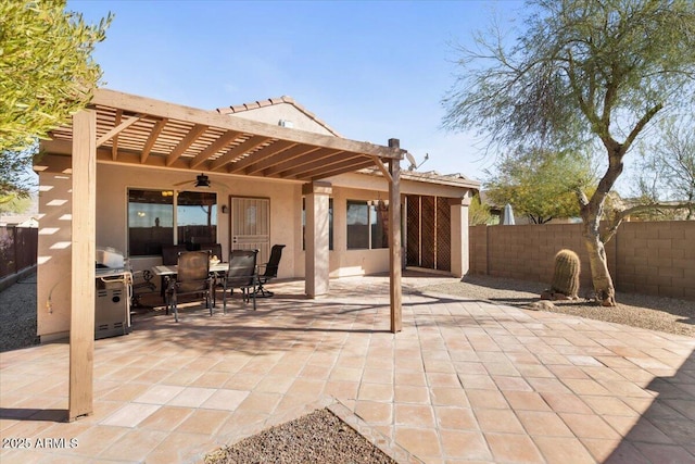 view of patio / terrace featuring a pergola and ceiling fan