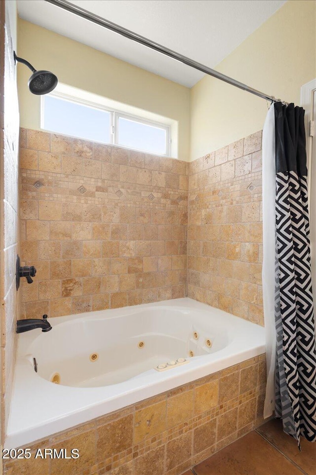 bathroom with shower / tub combo with curtain