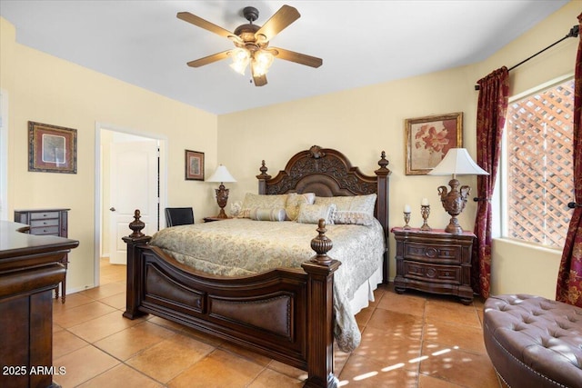 bedroom featuring light tile patterned floors and ceiling fan