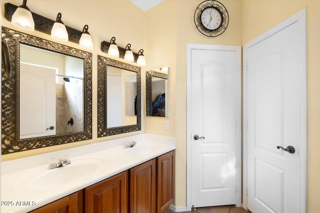 bathroom with vanity and walk in shower