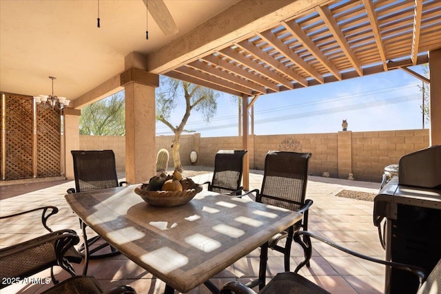 view of patio with ceiling fan