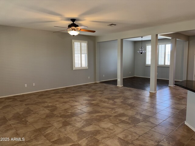 tiled dining area featuring an inviting chandelier