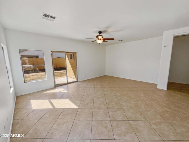 5339 W Maldonado Rd, Laveen, AZ 85339 - unfurnished room featuring a ceiling fan and light tile patterned flooring