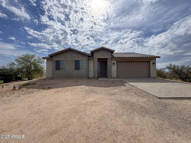 30507 N 167th St, Scottsdale, AZ 85262 - ranch-style house with dirt driveway, stucco siding, a garage, and a tile roof