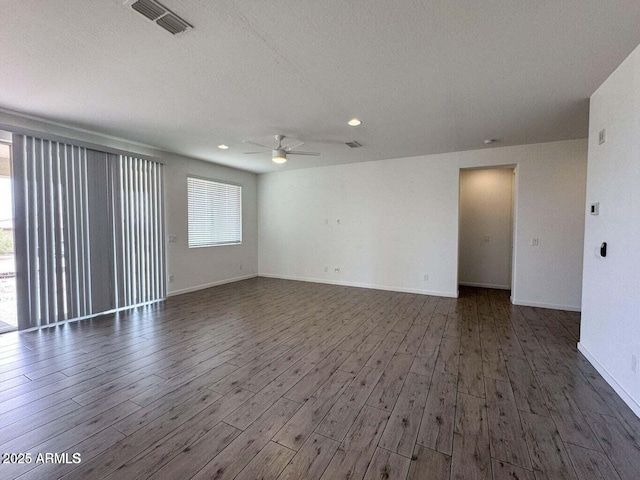 30507 N 167th St, Scottsdale, AZ 85262 - spare room featuring ceiling fan, wood finished floors, baseboards, recessed lighting, and a textured ceiling