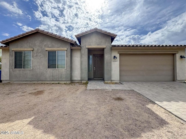 30507 N 167th St, Scottsdale, AZ 85262 - view of front of home featuring an attached garage, driveway, and a tile roof