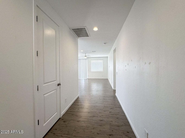 30507 N 167th St, Scottsdale, AZ 85262 - hall featuring dark wood-style flooring, baseboards, and recessed lighting